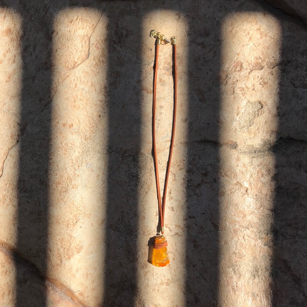 Orange crystal pendant necklace, leather chain